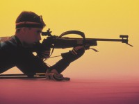 Man aiming a rifle